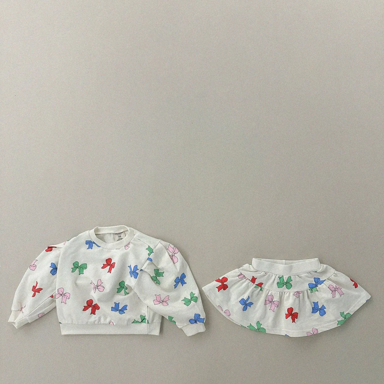 Girls Bow Print Sweatshirt & Skirt Set (1-6y) - 2 Colors