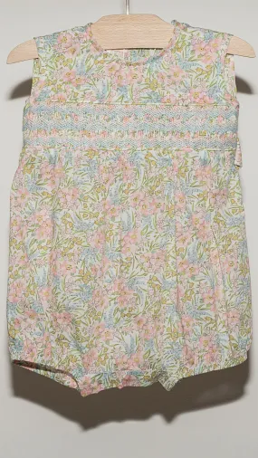 HAND SMOCKED BABY ROMPER IN PINK LIBERTY FLOWERS.NO SLEEVES. NO NECK.