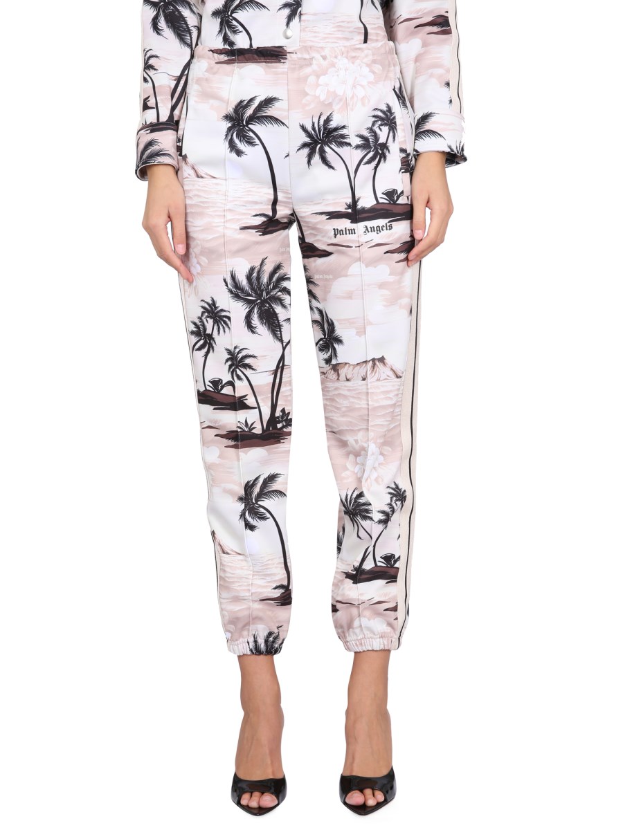 PALM ANGELS    ISLAND PRINT PANTS IN TECHNICAL FABRIC