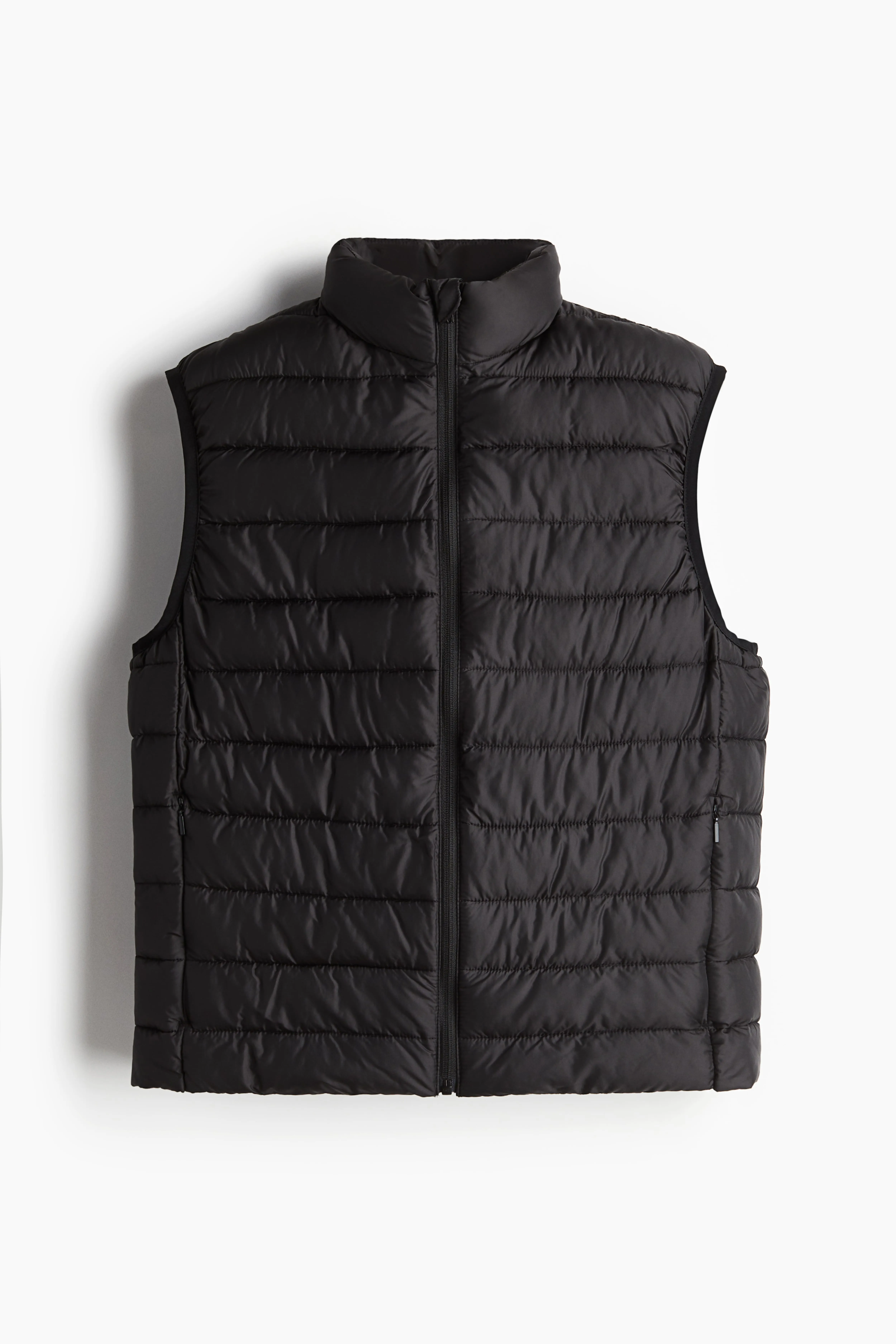 Slim Fit Lightweight puffer gilet - Sleeveless - Regular length - Black - Men | H&M GB